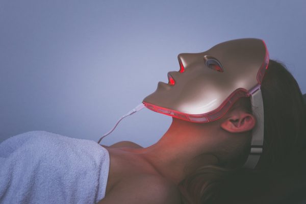 woman  with led light therapy facial  beauty mask photon therapy
