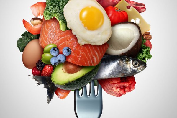 Eating ketogenic food and Keto nutrition lifestyle diet low carb and high fat meal as fish nuts eggs meat avocado and other healthy ingredients as a therapeutic snacks on a fork with 3D illustration elements.